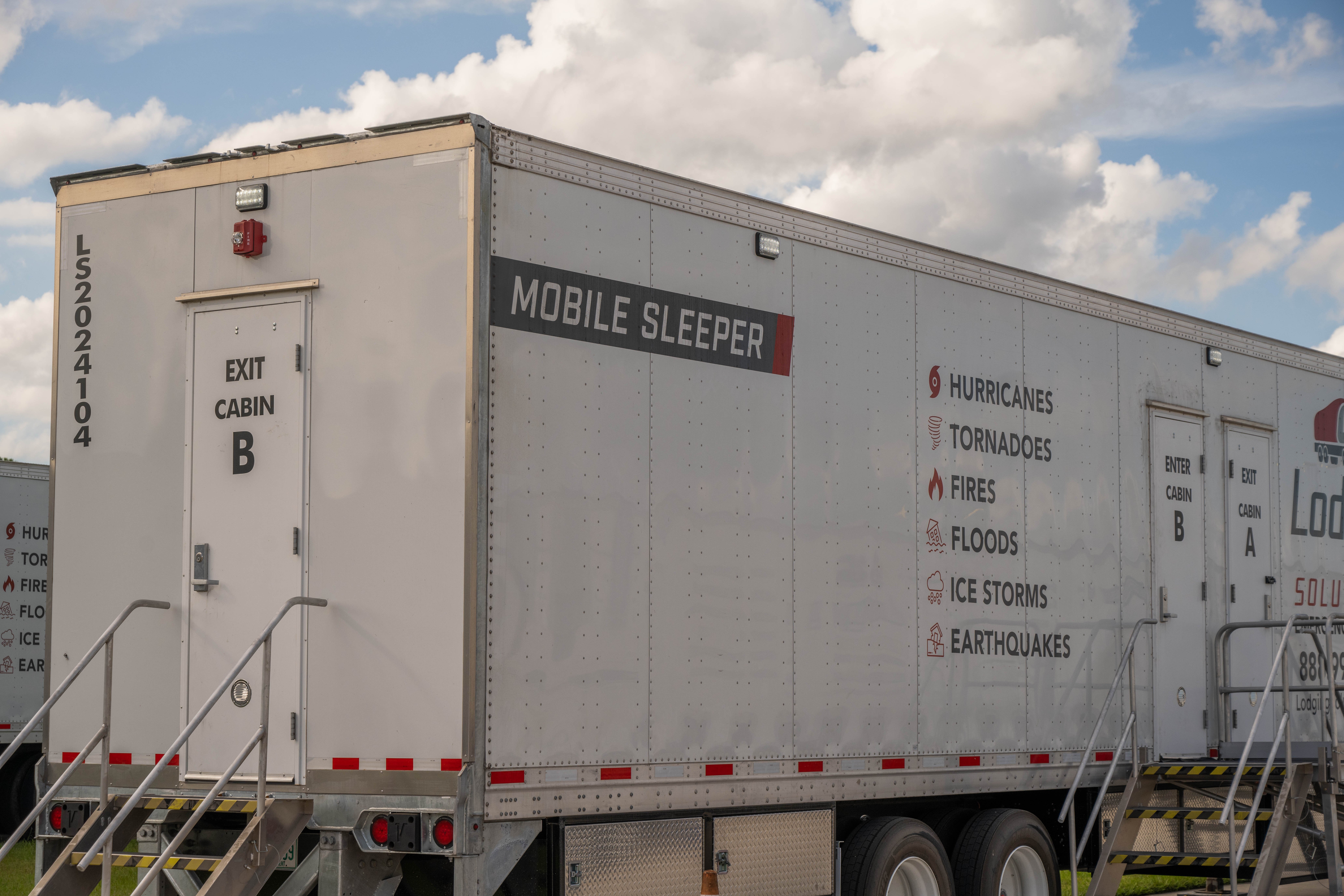Lodging Solutions and Industrial Tents - Case Study Photo - Hurricane Ian Recovery Base Camp Melbourne FL Project - MOBILE SLEEPER TRAILER PHOTO